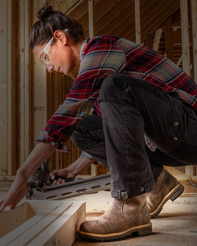 Person Standing On Red Ladder